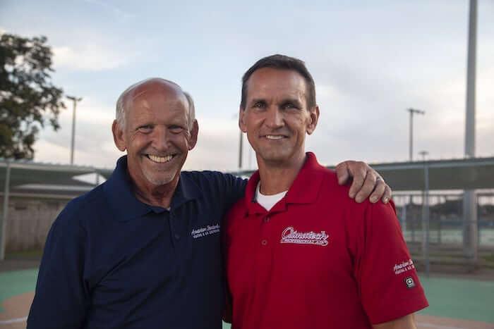 Father and son duo Larry and Travis Thompson of Climatech Professional Air smile and pose for the camera.
