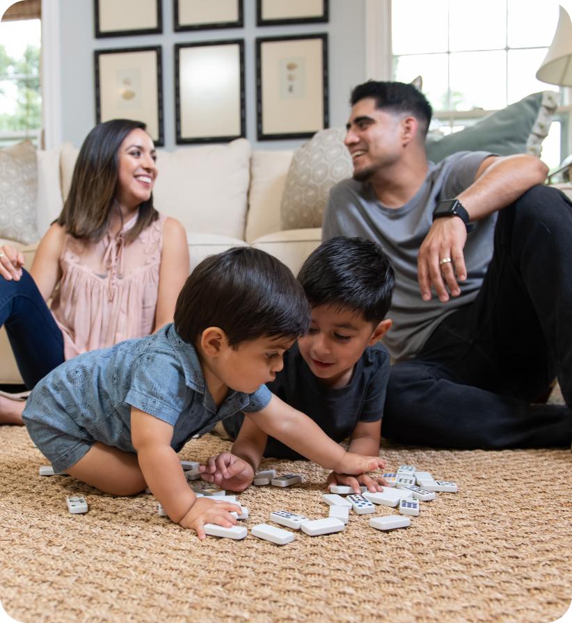 A family playing together in their living room.