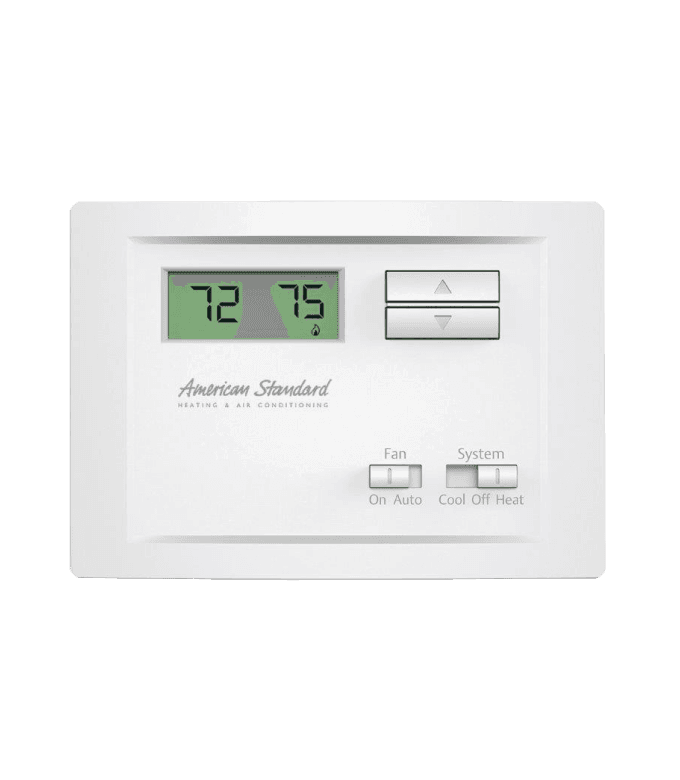 A white Silver 102 thermostat control unit with manual button entry and small digital display.