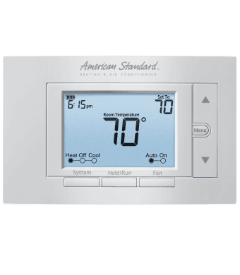 a silver thermostat with manual controls, displaying a temperature of 70 degrees.