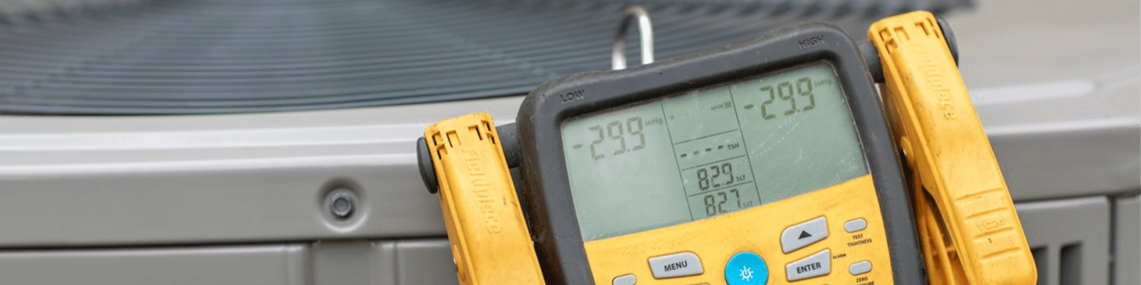 An American Standard heat pump is being repaired.