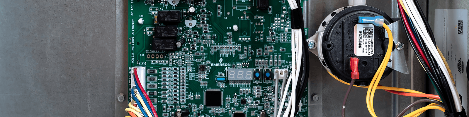 Close-up of Gas Furnace Inside Control Board with Wiring